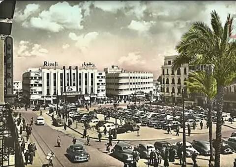 بيروت الخمسينيات  ساحة البرج  وقد بدا في أقصى اليسار طرف مبنى سينما opera  موقع مبنى vigin في أيامنا الحاضرة 